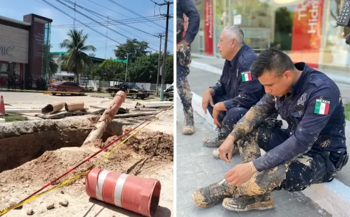 Los agentes de policía y bomberos, cubiertos de tierra, se preparan para continuar con las labores de rescate tras el derrumbe en Chetumal.