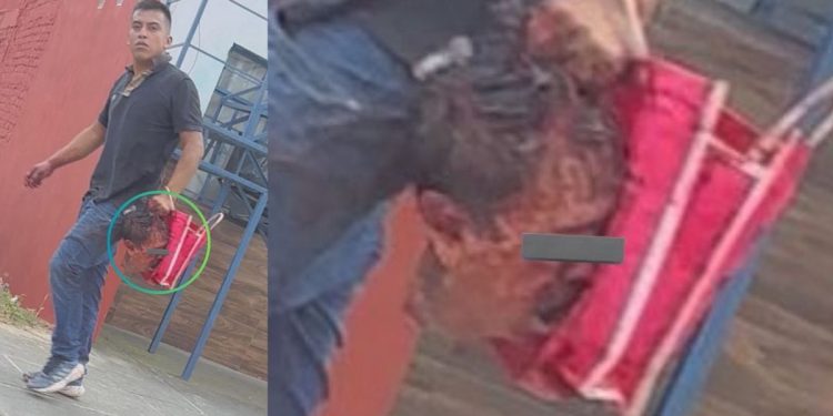 Hombre camina con una cabeza humana en Coatepec, Veracruz
