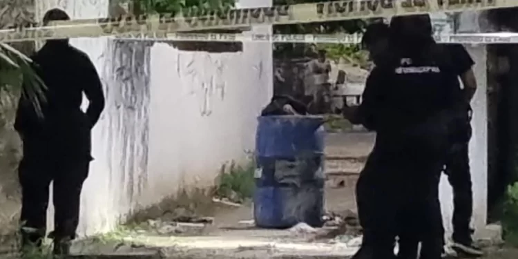 Hallan cuerpo dentro de tambo en Villas Otoch Paraíso