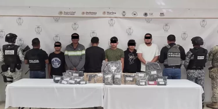 Capturan a seis hombres ligados a quema de autos en Playa del Carmen